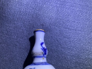 Five Chinese mostly blue and white vases, Kangxi